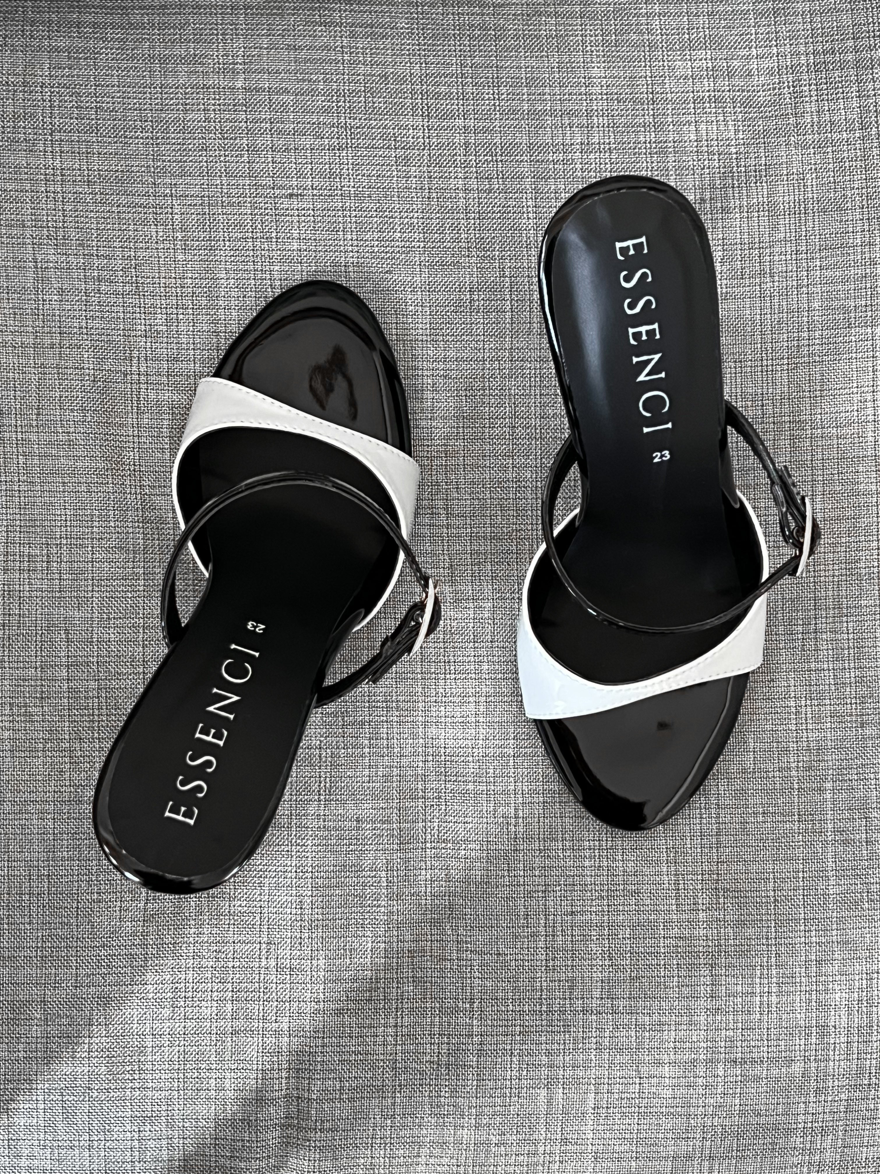 Zapatilla destalonada blanco y negro